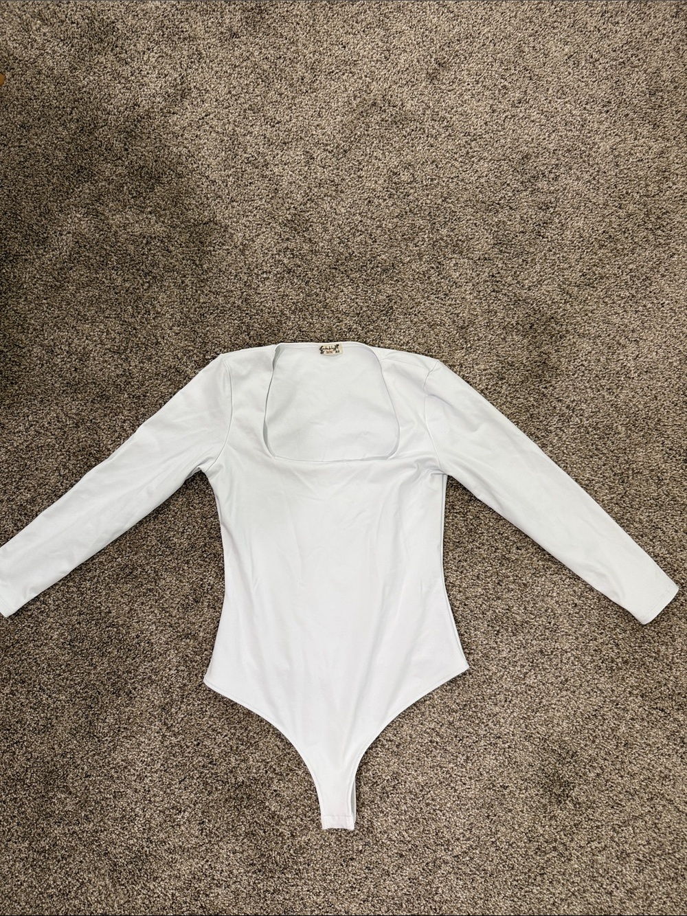 Free People White Long-Sleeve One-Piece Bodysuit